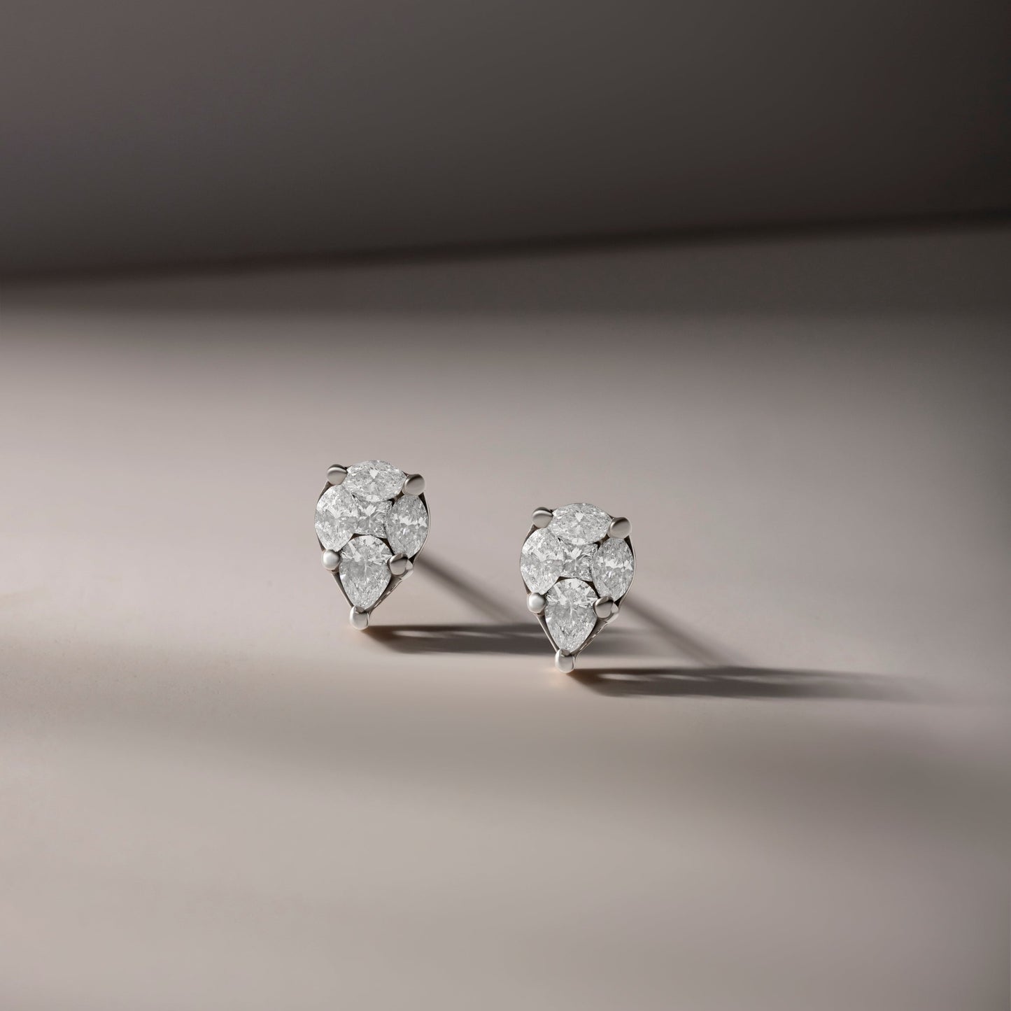 TWINKLING TEARDROP DIAMOND STUDDED YELLOW GOLD EARRINGS